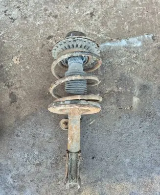 Chrysler Grand Voyager IV Front shock absorber with coil spring