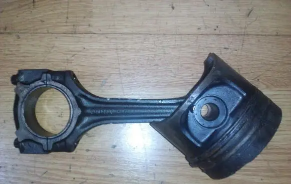 Piston with connecting rod