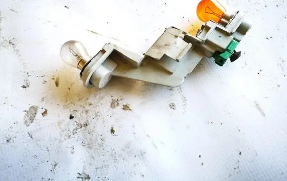Volvo V50 Tail light bulb cover holder
