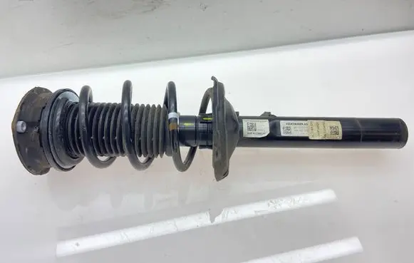 Volkswagen Golf VIII Front shock absorber with coil spring 5Q0413023 5Q0412043AP