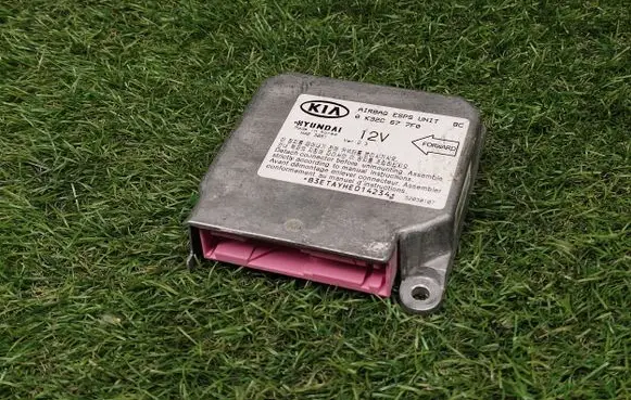 KIA Rio Airbag control unit/module 0K32C677F0