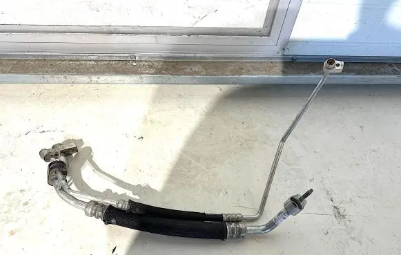 Tesla Model X Air conditioning (A/C) pipe/hose 103733400H 1037334