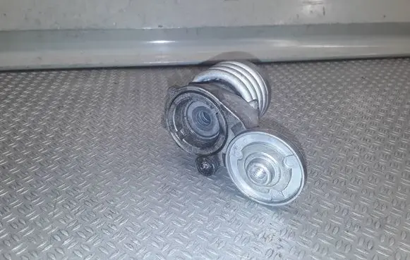 Generator/alternator belt tensioner