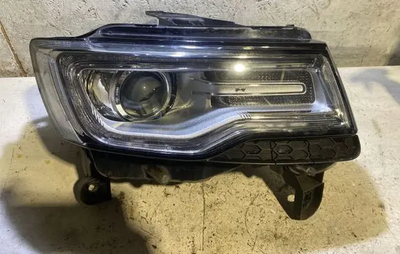 Jeep Grand Cherokee Headlight/headlamp M167615 323604