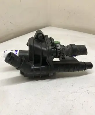 Thermostat/thermostat housing