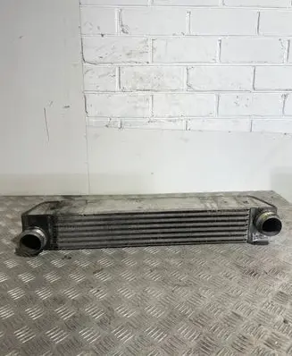 BMW 5 E60 E61 Intercooler radiator 7795823 F6438000