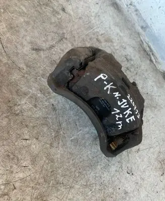 Nissan Juke I F15 Front brake caliper