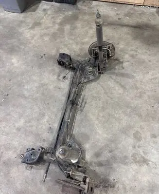 Nissan Juke I F15 Rear axle beam 55501BV80A