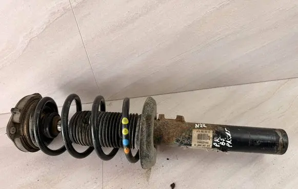 Volkswagen PASSAT B7 Front shock absorber with coil spring 3C0413031N