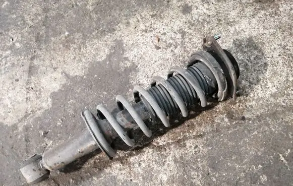 Subaru Impreza III Rear shock absorber with coil spring 