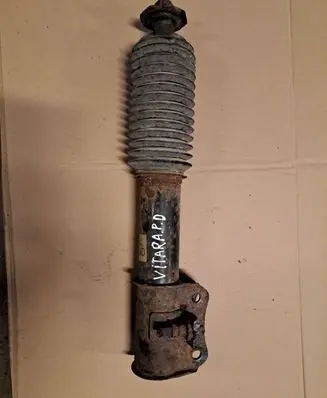 Suzuki Grand Vitara I Front shock absorber/damper 4160285CA0 22119084