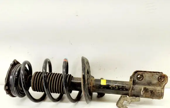 Nissan Leaf I (ZE0) Front shock absorber/damper