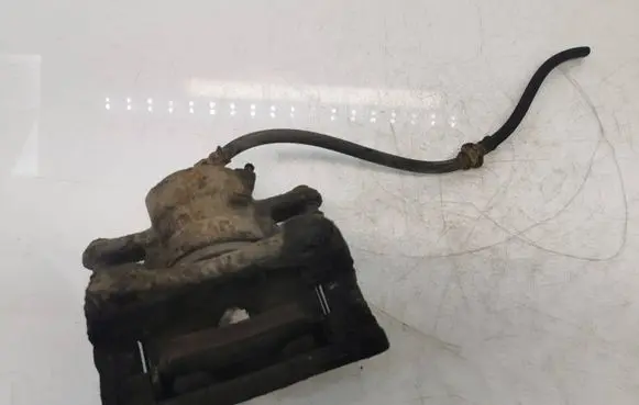 Nissan Note (E11) Front brake caliper