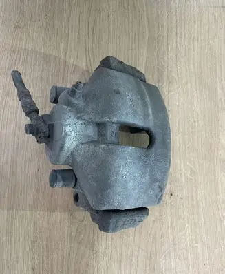 Volkswagen PASSAT B6 Front brake caliper 581