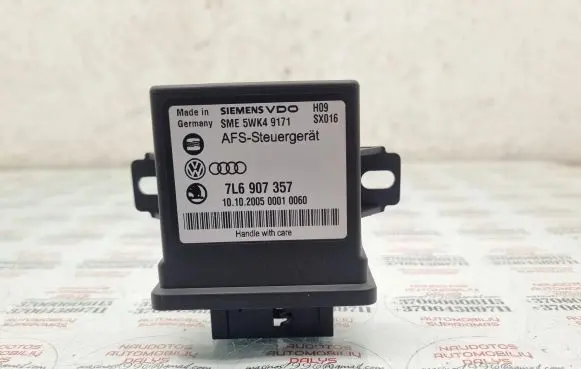 Volkswagen Touareg I Light module LCM 7L6907357