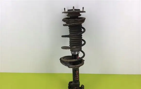 Toyota Yaris Front shock absorber with coil spring 