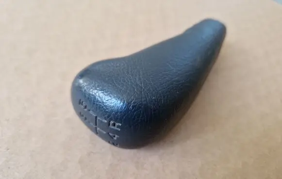 Mitsubishi Pajero Sport I Gear lever shifter trim leather/knob 