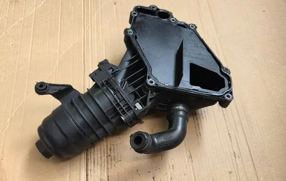 Volvo XC60 Oil filter mounting bracket 6740273109