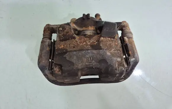 Opel Astra J Front brake caliper 
