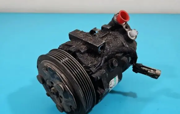 Opel Tigra B Air conditioning (A/C) compressor (pump) 24461719 IMPRK1404091