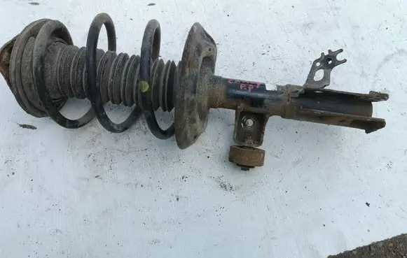 Toyota Camry VIII XV70 Front shock absorber with coil spring 485108Z335 4813106E90