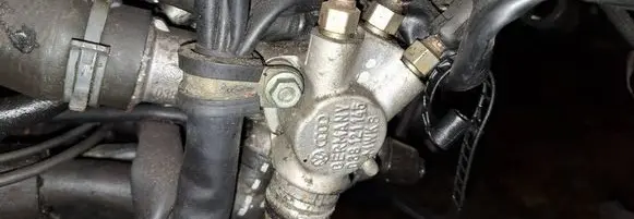 Volkswagen PASSAT B5.5 Engine coolant pipe/hose 038121145