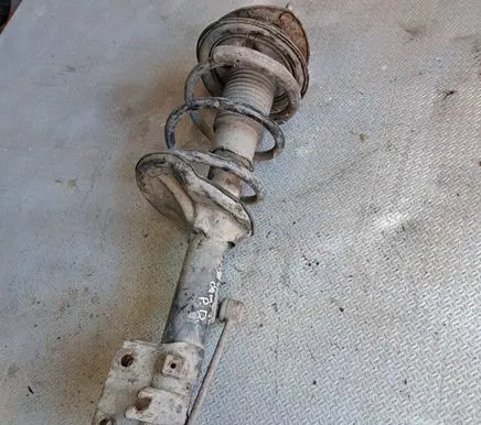KIA Sportage Front shock absorber with coil spring