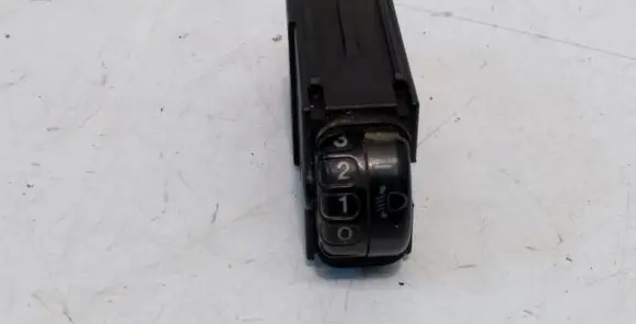 Headlight level height control switch