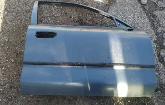 Mitsubishi Carisma Front door melynos