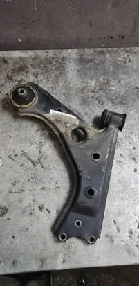 Opel Corsa E Front lower control arm/wishbone 13167940
