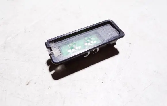 Volkswagen PASSAT CC Number plate light 1K8943021C