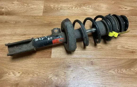 Opel Zafira A Front shock absorber with coil spring JGM2348T