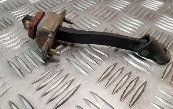 Subaru Legacy Front door check strap stopper