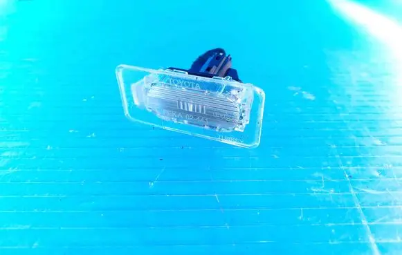 Toyota Corolla E210 E21 Number plate light 22093