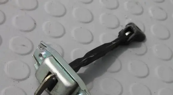 Toyota RAV 4 (XA30) Front door check strap stopper ORANICZNIKLEWYRAV4
