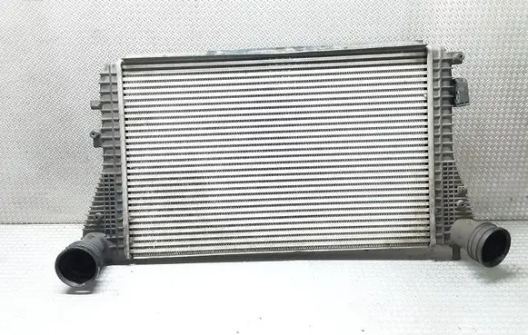 Volkswagen Touran I Intercooler radiator 1K0145803L