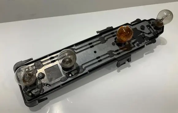 Mercedes-Benz C W203 Tail light bulb cover holder