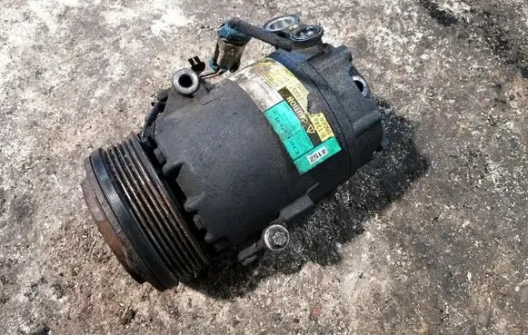 Opel Zafira A Air conditioning (A/C) compressor (pump) 24464152
