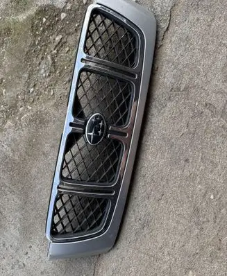 Subaru Forester SF Front bumper upper radiator grill