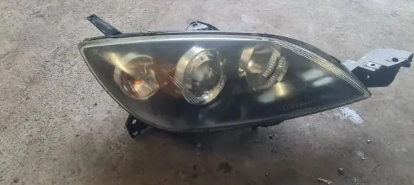 Mazda 3 I Headlight/headlamp 20A859
