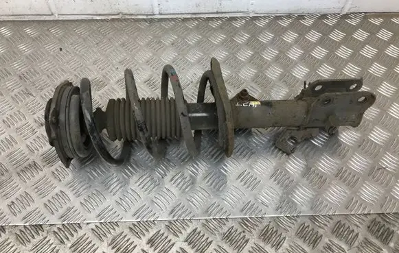 Nissan Leaf I (ZE0) Front shock absorber/damper