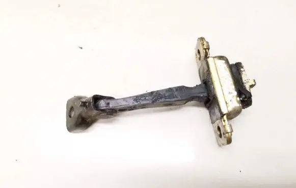 Front door check strap stopper