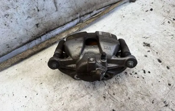 Opel Corsa F Front brake caliper