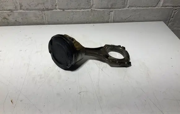 Piston with connecting rod