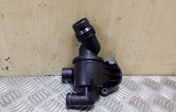 Thermostat/thermostat housing