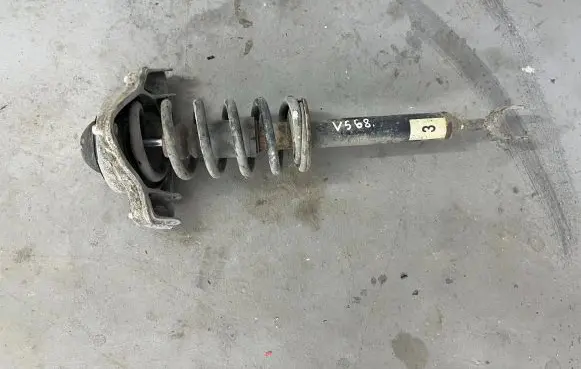 Audi A6 S6 C6 4F Front shock absorber with coil spring