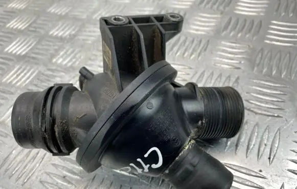 Thermostat/thermostat housing