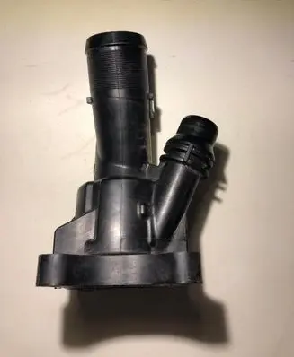 Thermostat/thermostat housing