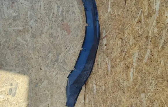 Mitsubishi Pajero Sport I Front wheel arch liner splash guards MR144728