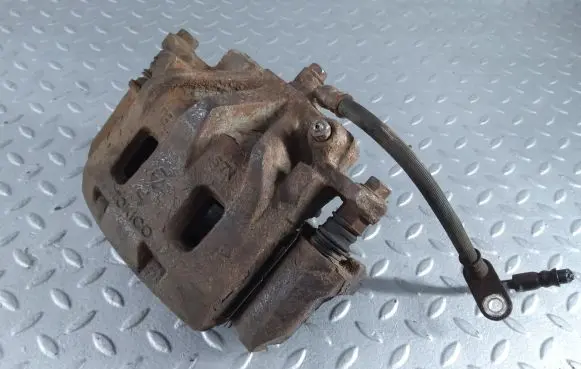 Subaru Outback (BS) Front brake caliper 26225AG060 26292AG041